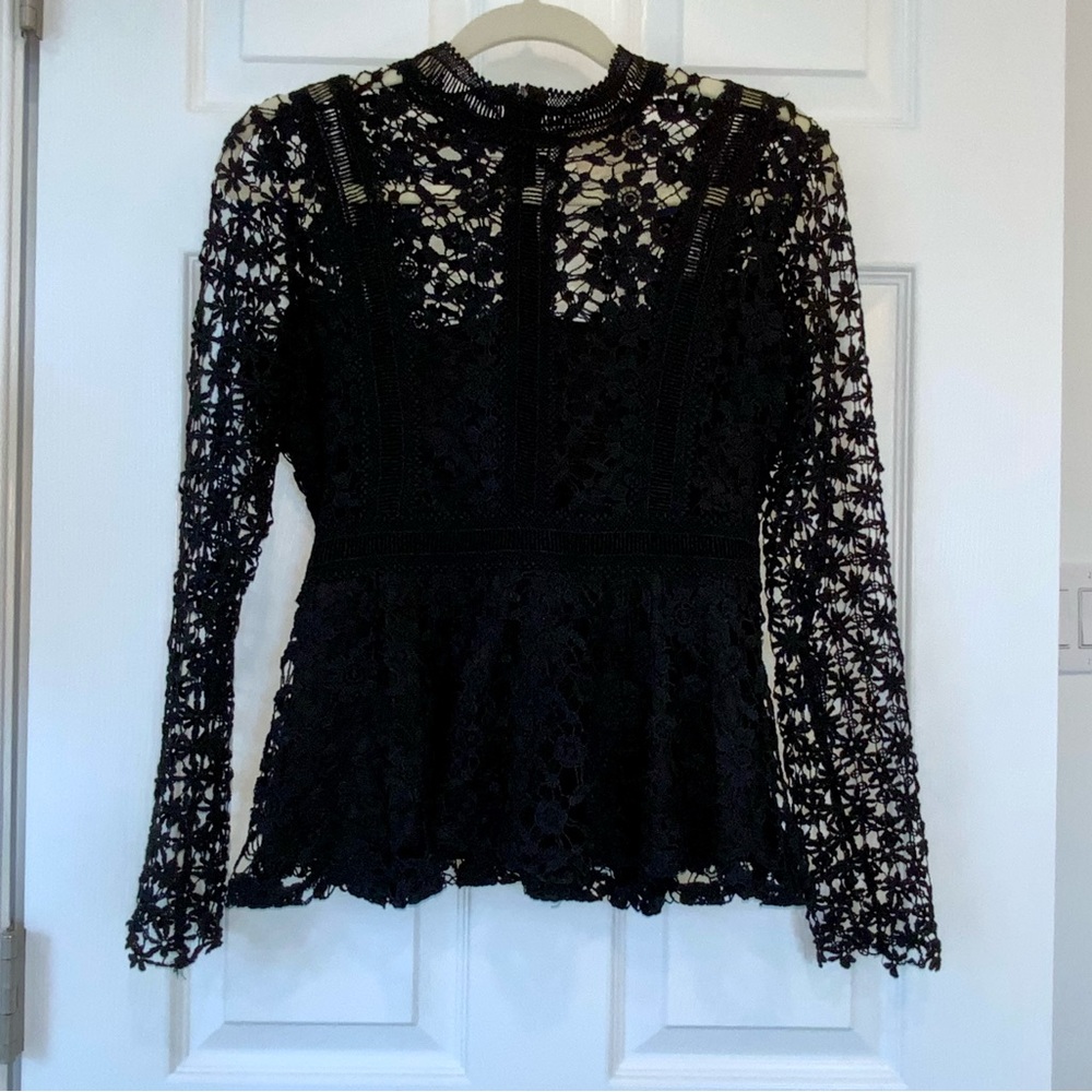 Long Sleeve peplum top in Black Size Small I. Madeline